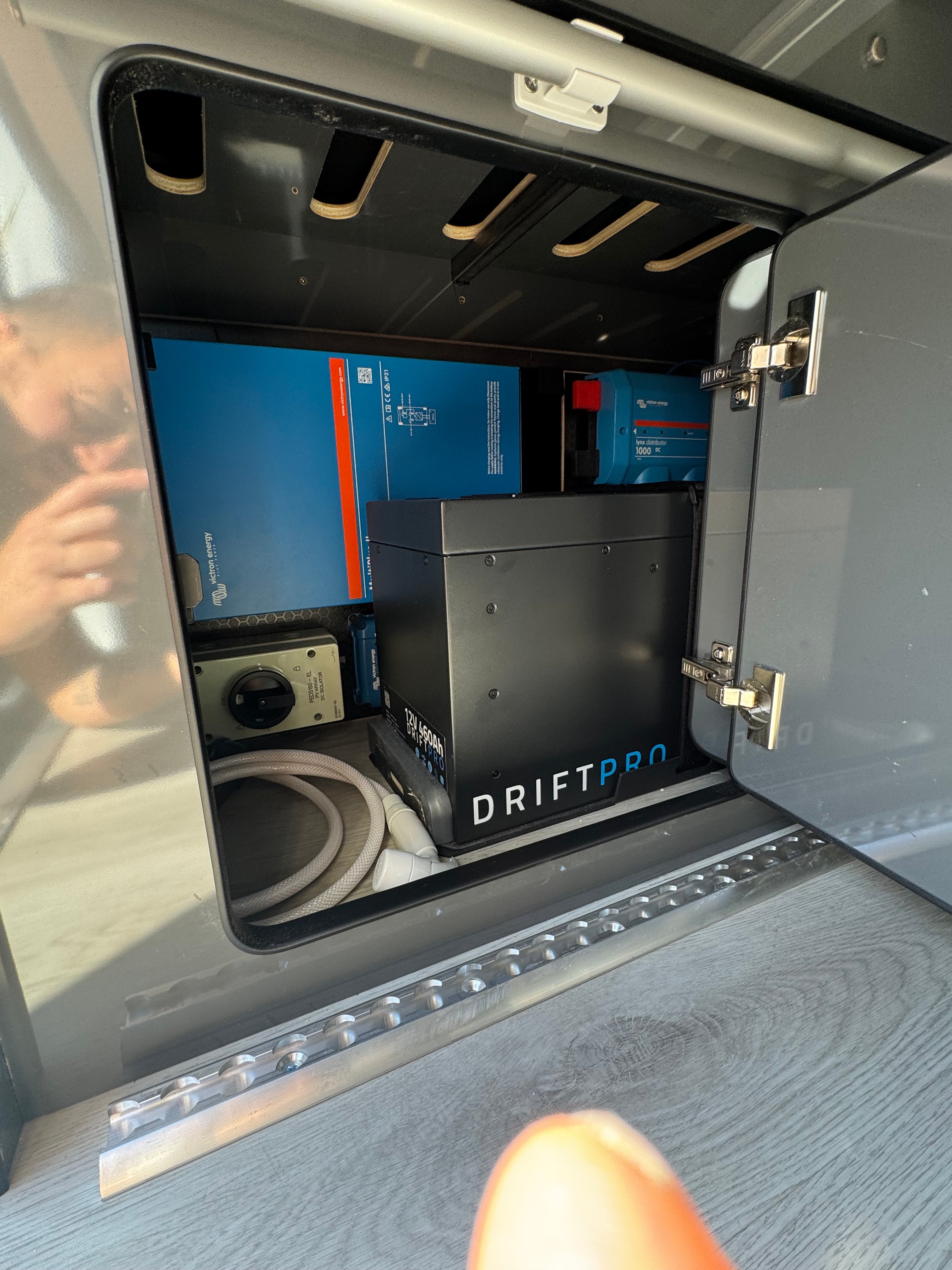 Fogstar DriftPro battery system in vehicle garage compartment